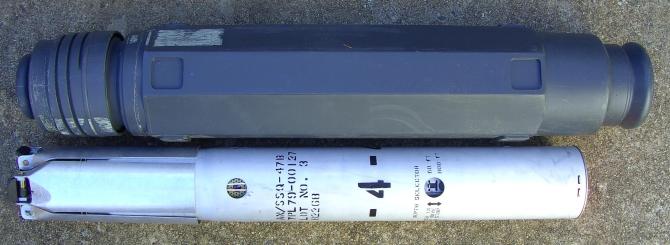 CNU-239/E shipping container and SSQ-47B sonobuoy.