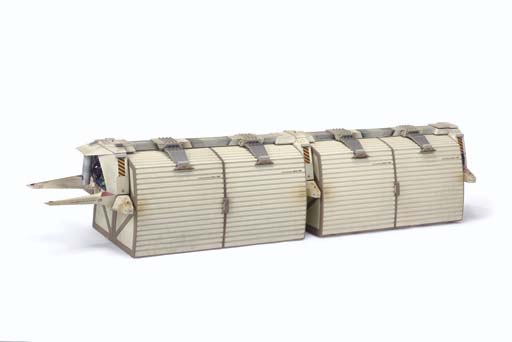 Workbee Cargo Train Model. A miniature cargo module train and carrier sled frame, designed to be attached to the Work Bee model. 84in. long, featured in the spacedock sequence of Star Trek: The Motion Picture. (Image courtesy: Christie's)